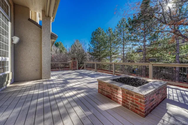 a view of a wooden roof with furniture