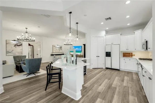 $899,000 | 9097 Cherry Oaks Trail, Unit 201, Naples, FL 34114