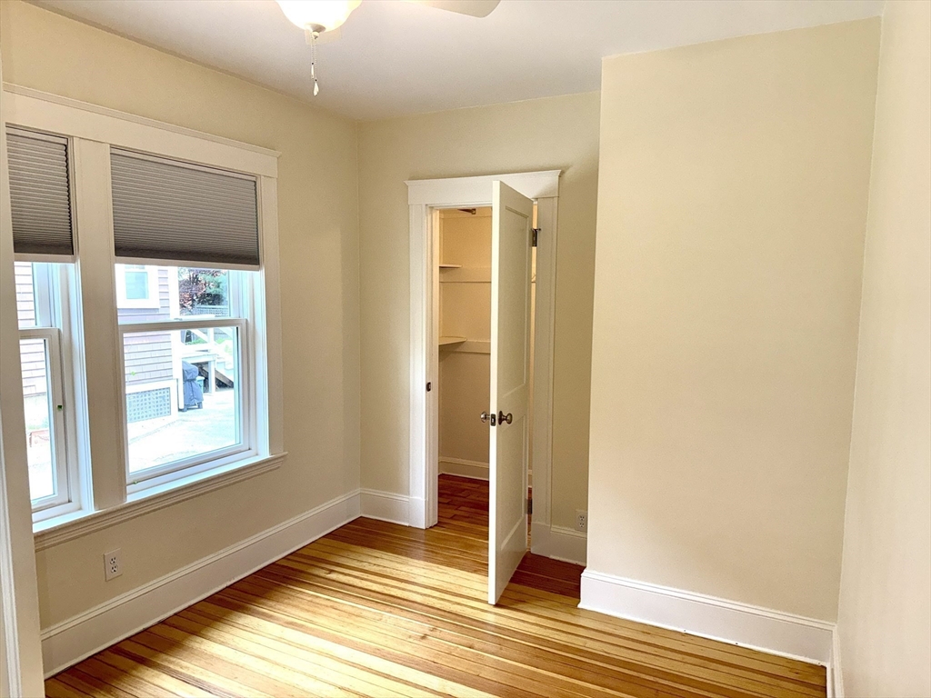 39 Newman Road Malden, MA 02148 - Photo 16 of 27 a view of a livingroom with wooden floor and a window