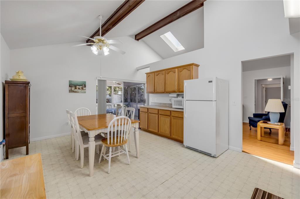 1981 South Merrick Drive Deltona, FL 32738 - Photo 11 of 30 a view of a dining room with furniture and a chandelier