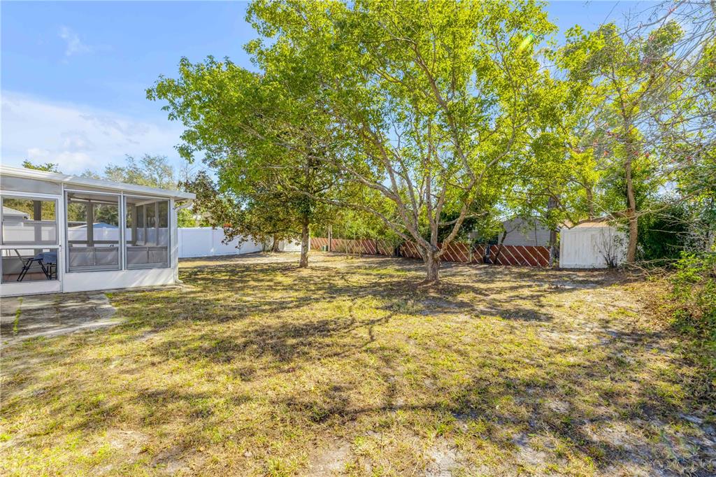 1981 South Merrick Drive Deltona, FL 32738 - Photo 21 of 30 a view of a house with swimming pool