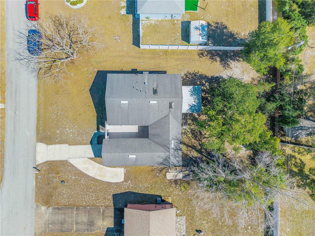 1981 South Merrick Drive Deltona, FL 32738 - Photo 24 of 30 an aerial view of residential houses with outdoor space