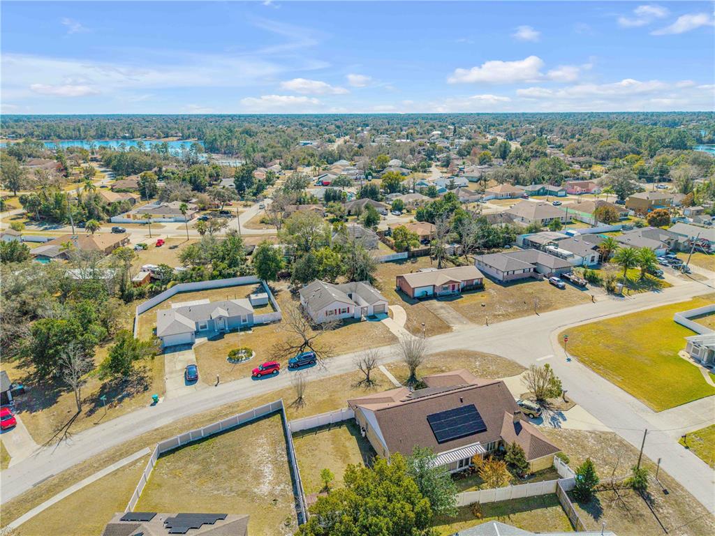 1981 South Merrick Drive Deltona, FL 32738 - Photo 26 of 30 an aerial view of a residential houses with outdoor space and swimming pool