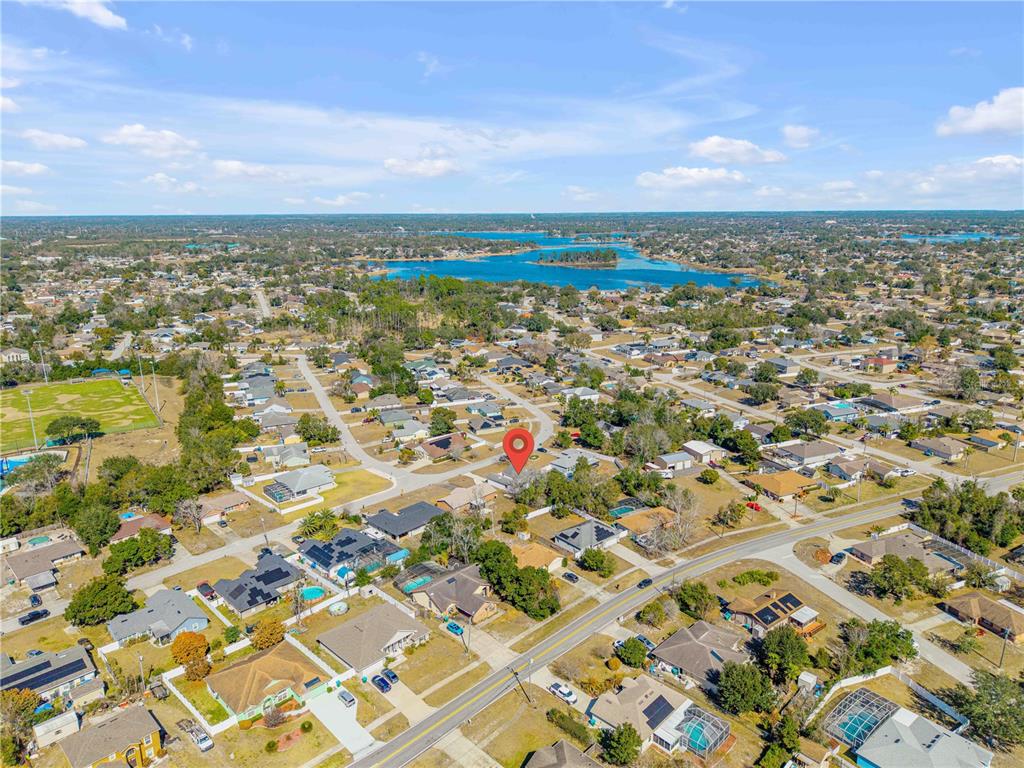 1981 South Merrick Drive Deltona, FL 32738 - Photo 29 of 30 an aerial view of residential building with parking space