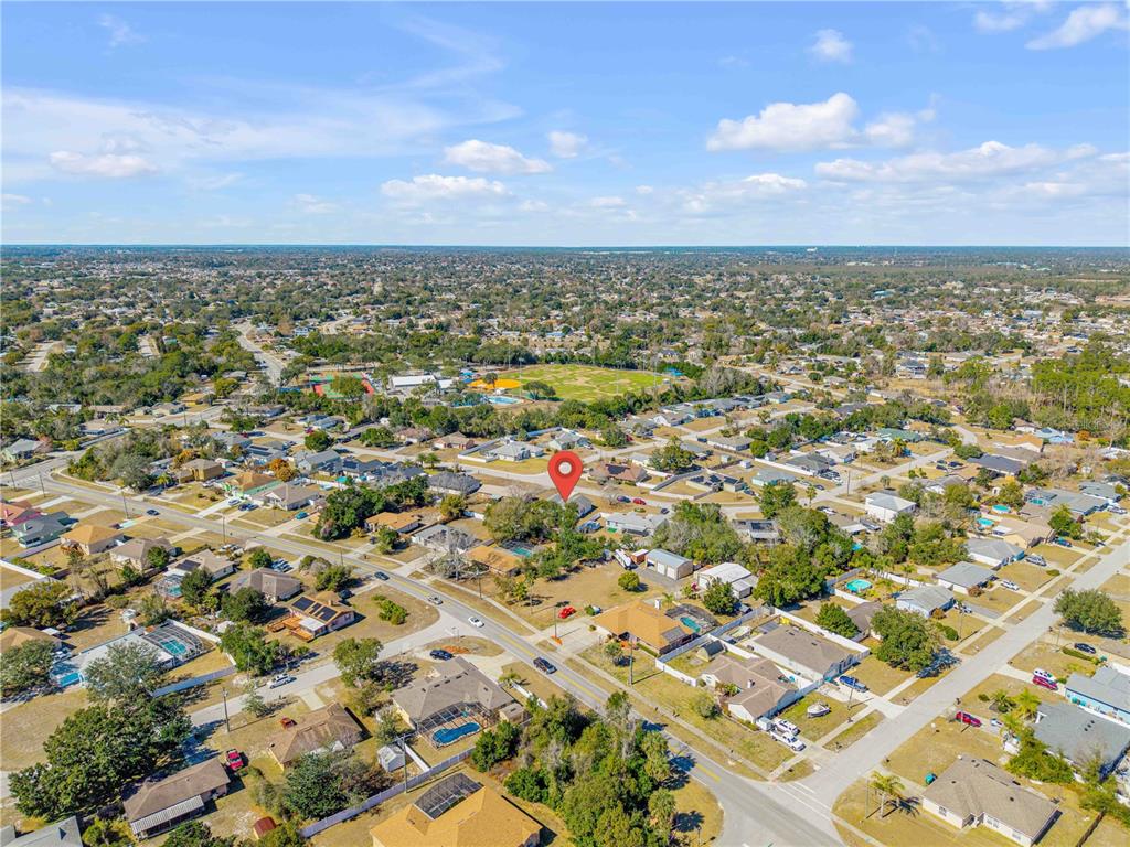 1981 South Merrick Drive Deltona, FL 32738 - Photo 30 of 30 an aerial view of residential building and lake