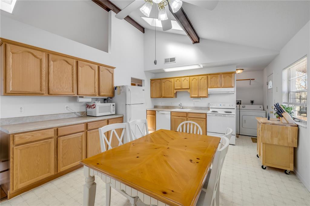 1981 South Merrick Drive Deltona, FL 32738 - Photo 9 of 30 a kitchen with cabinets and window