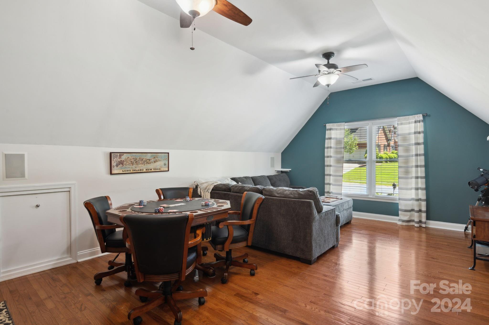 1418 Reverdy Oaks Drive Matthews, NC 28105 - Photo 35 of 45 a view of a dining room with furniture window and wooden floor