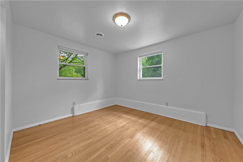 492 Center Grange Road Monaca, PA 15061 - Photo 15 of 36 an empty room with a window