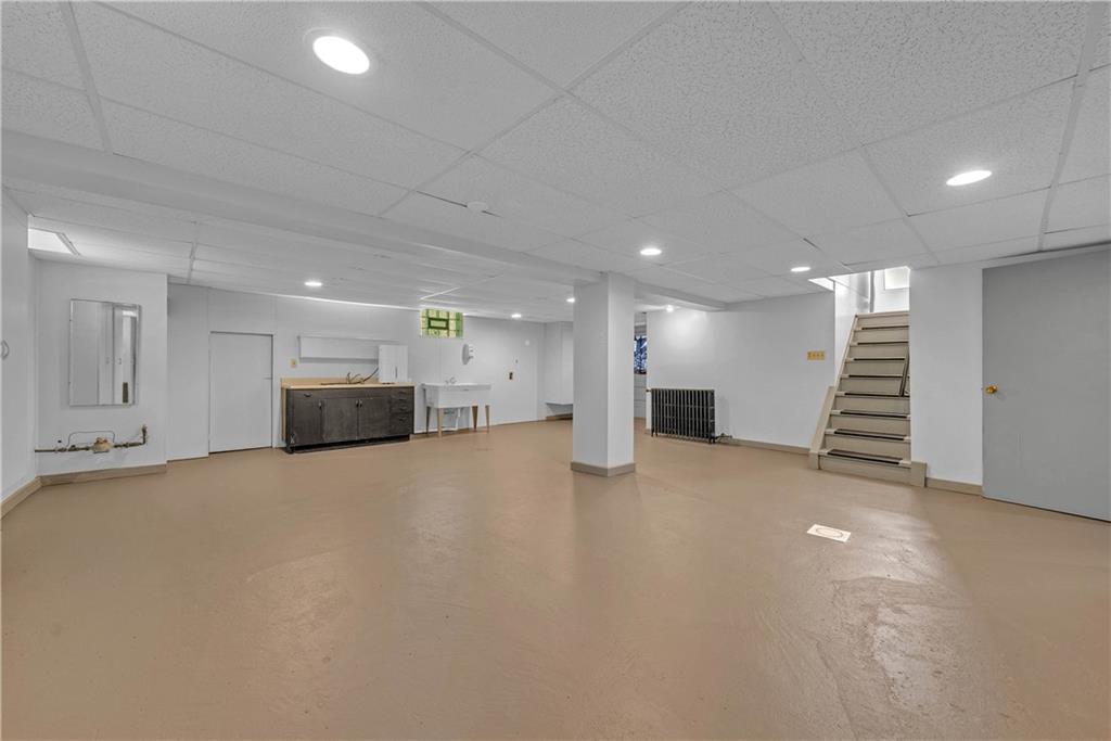 492 Center Grange Road Monaca, PA 15061 - Photo 20 of 36 a view of an empty room with a kitchen