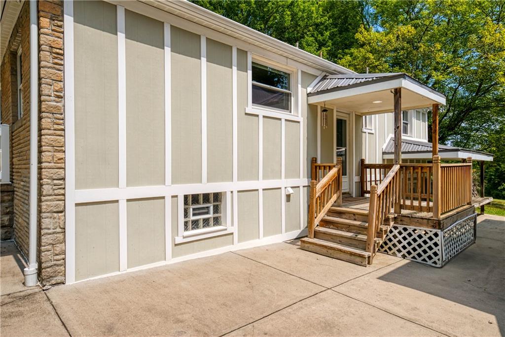 492 Center Grange Road Monaca, PA 15061 - Photo 33 of 36 a view of a white house with large windows
