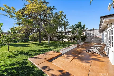 a view of a park with large trees