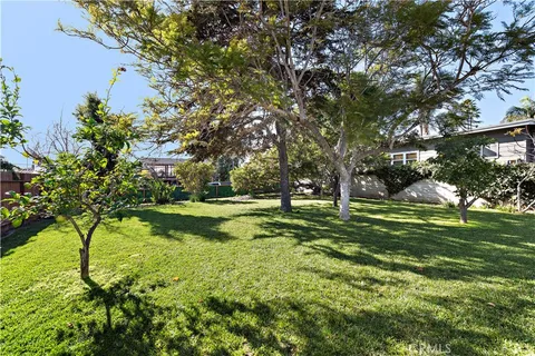 a view of a house with a big yard