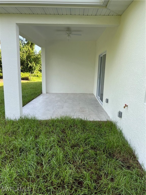 3961-3963 Sunset Road Lehigh Acres, FL 33971 - Photo 15 of 18 a view of backyard with garden and plants