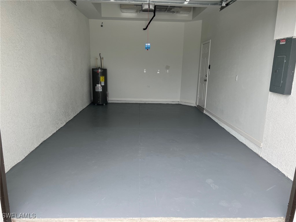 3961-3963 Sunset Road Lehigh Acres, FL 33971 - Photo 17 of 18 a view of a room with an empty space