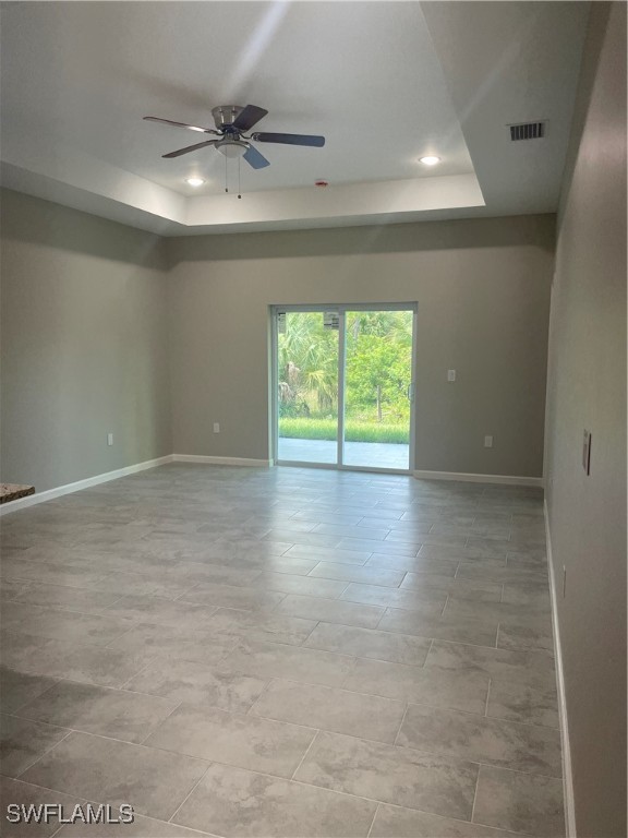 3961-3963 Sunset Road Lehigh Acres, FL 33971 - Photo 7 of 18 a view of an empty room with a window