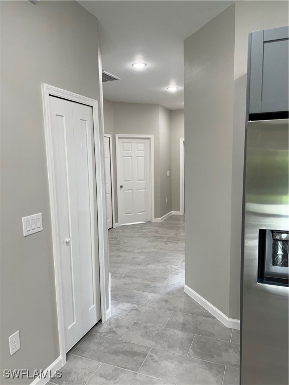 3961-3963 Sunset Road Lehigh Acres, FL 33971 - Photo 9 of 18 a view of entryway with front door