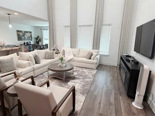 13725 Rising Sun Lane Conroe, TX 77384 - Photo 4 of 29 a living room with fireplace furniture and a flat screen tv