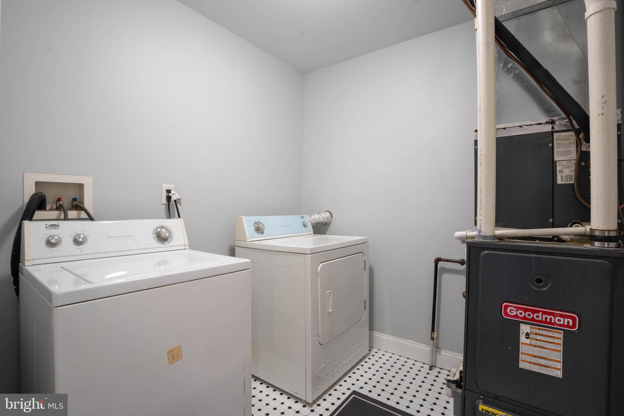 2212 North 16th Street, Unit 2 Philadelphia, PA 19132 - Photo 16 of 18 a utility room with dryer and washer