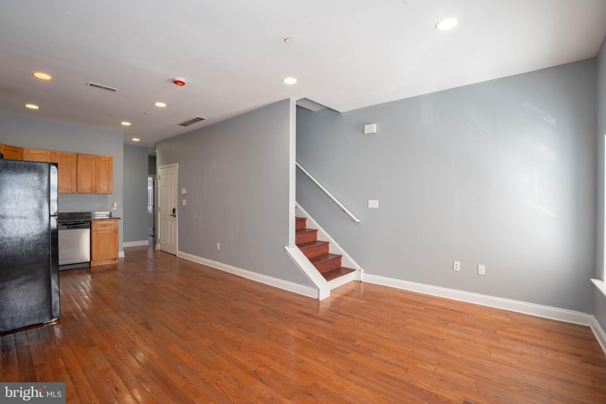 2212 North 16th Street, Unit 2 Philadelphia, PA 19132 - Photo 3 of 18 a view of empty room with wooden floor