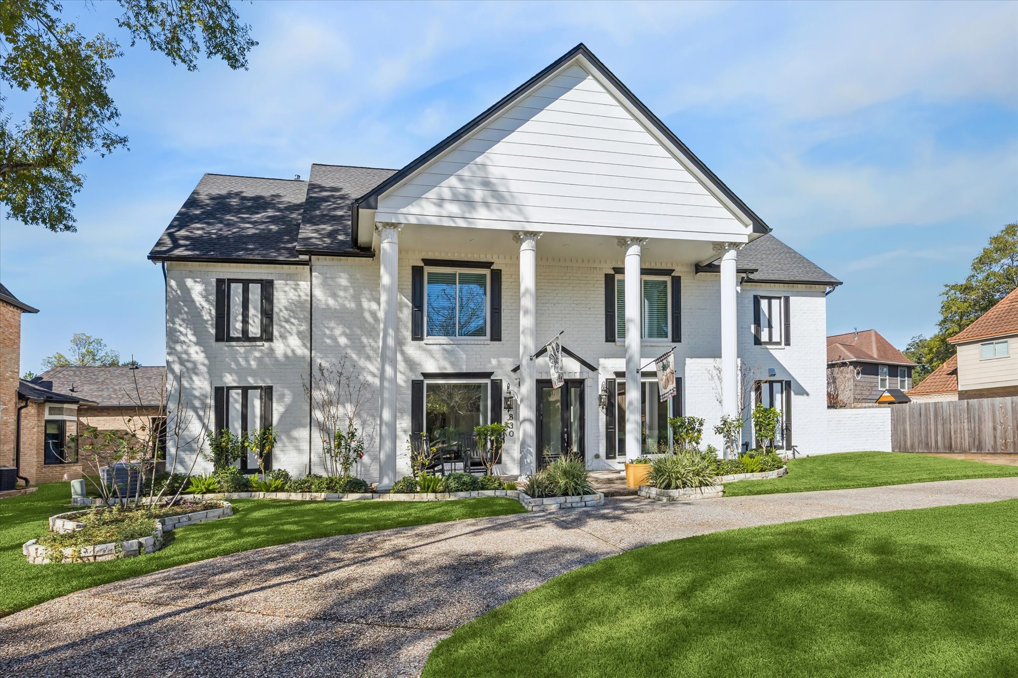 830 Silvergate Drive Houston, TX 77079 - Photo 2 of 38 front view of a house with a yard