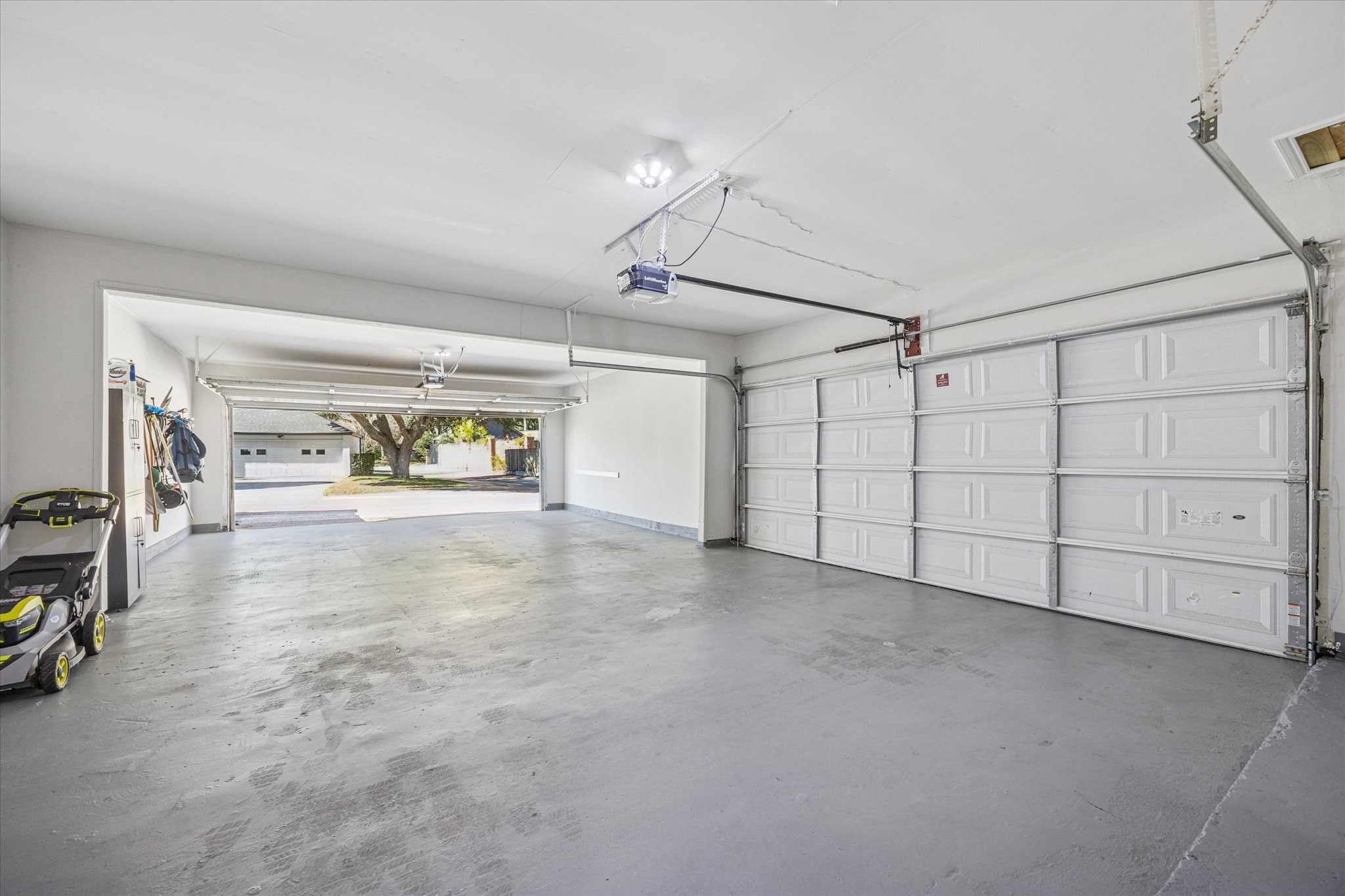 830 Silvergate Drive Houston, TX 77079 - Photo 34 of 38 a view of a garage with furniture