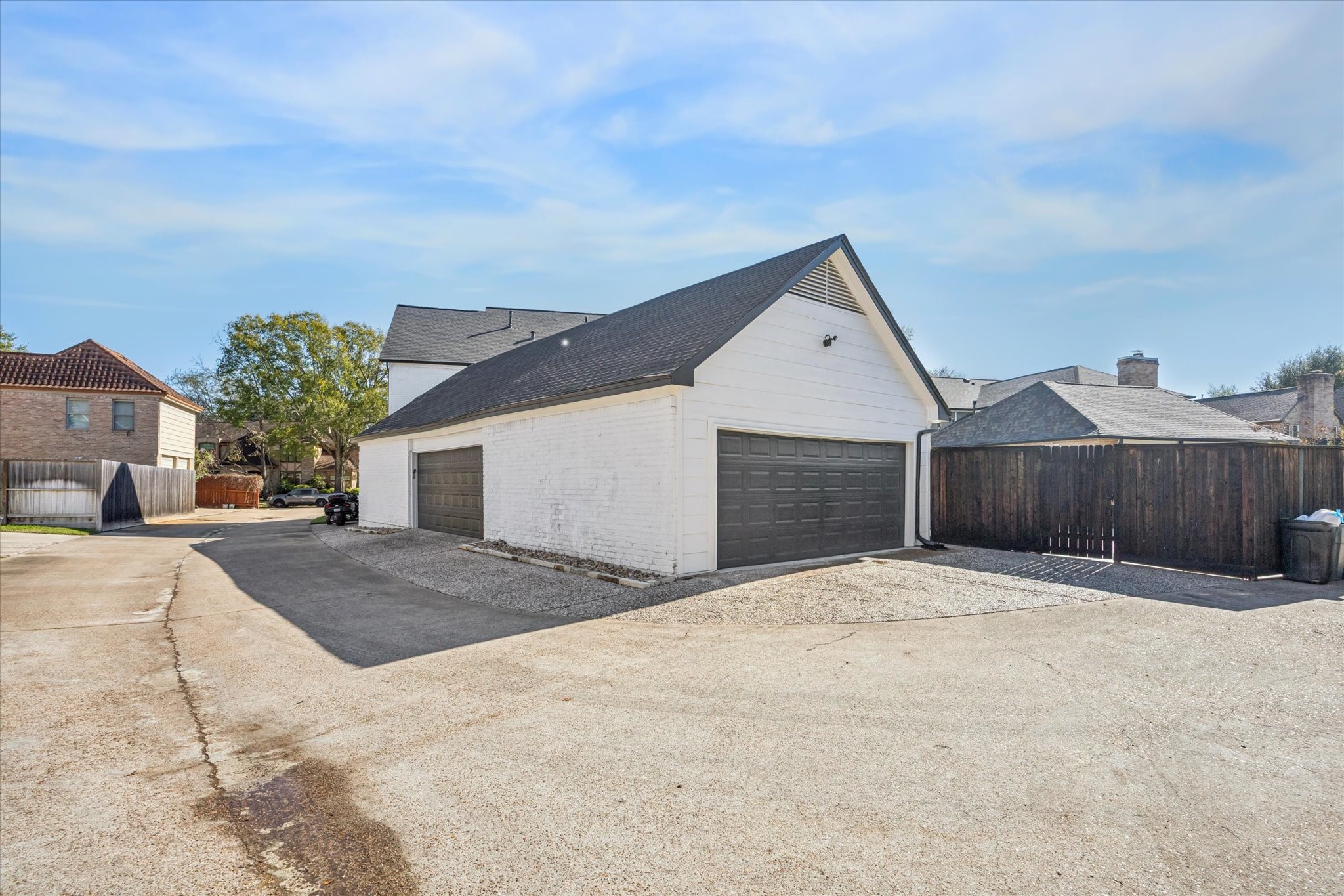 830 Silvergate Drive Houston, TX 77079 - Photo 38 of 38 a view of an house with a yard and garage