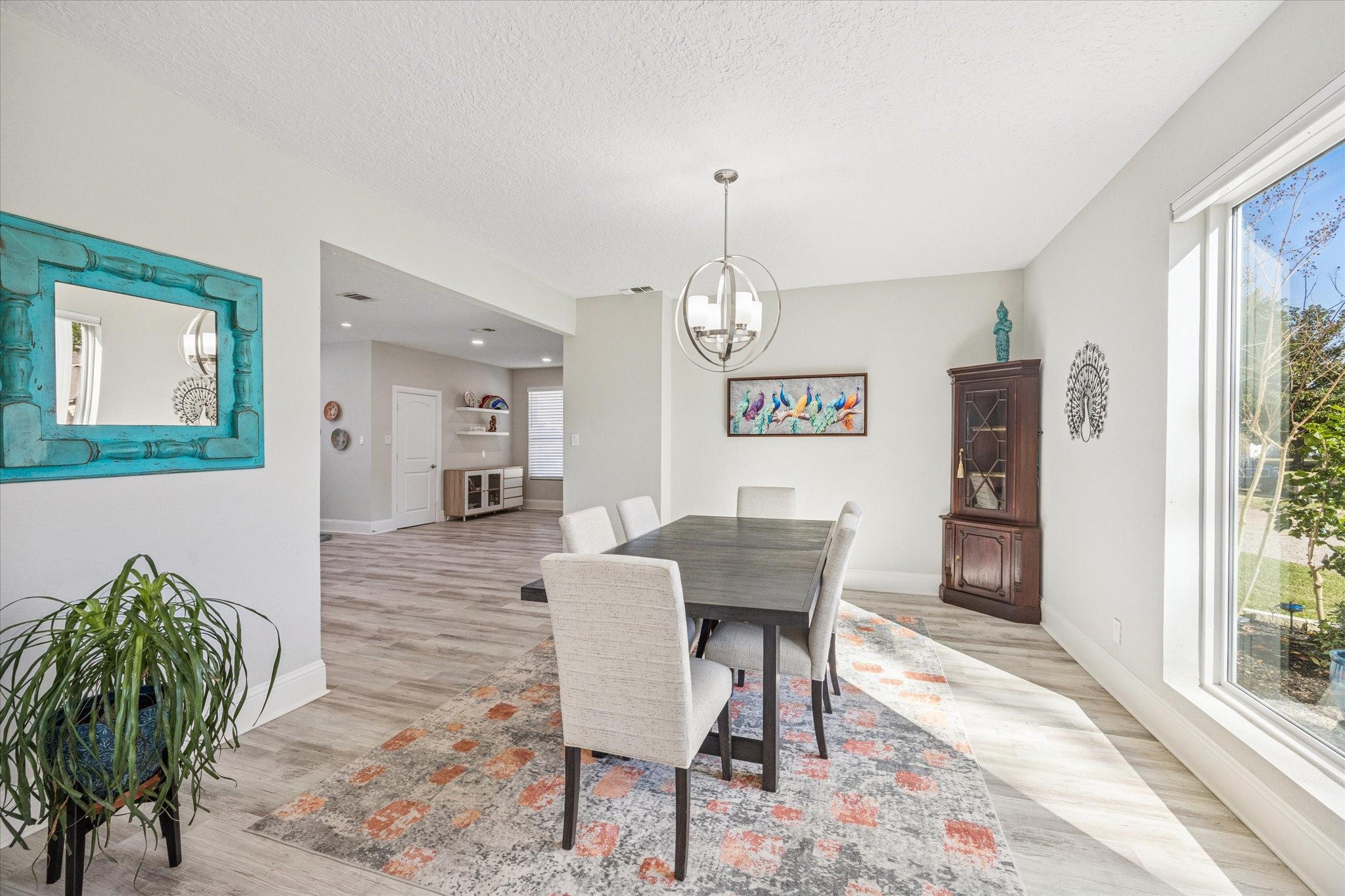830 Silvergate Drive Houston, TX 77079 - Photo 8 of 38 a view of a dining room with furniture and window