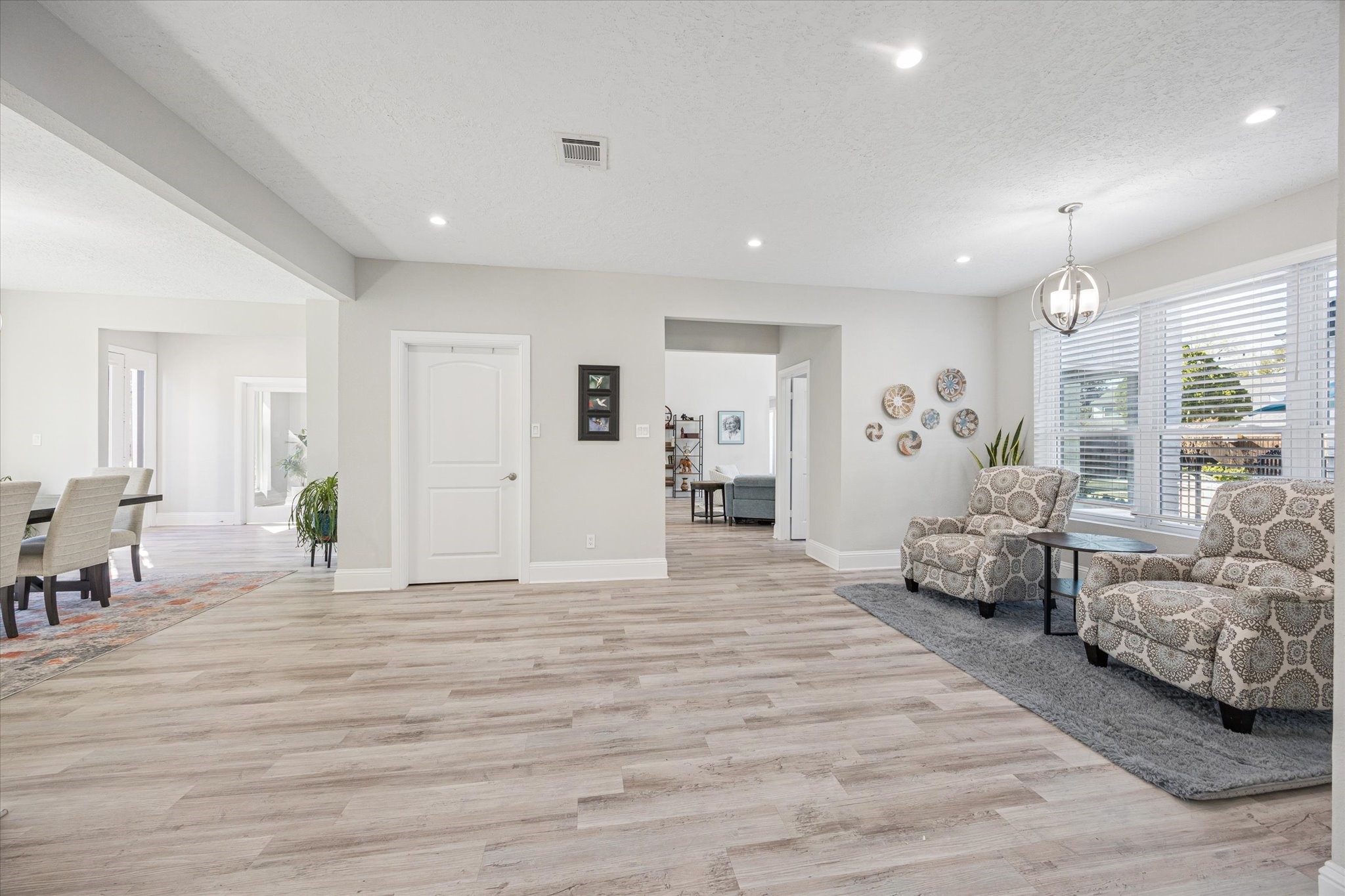 830 Silvergate Drive Houston, TX 77079 - Photo 10 of 38 a view of a livingroom with furniture and windows