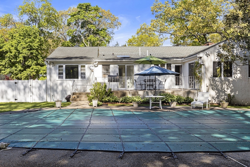 156 Woodcliff Road Newton, MA 02461 - Photo 14 of 17 a front view of a house with garden