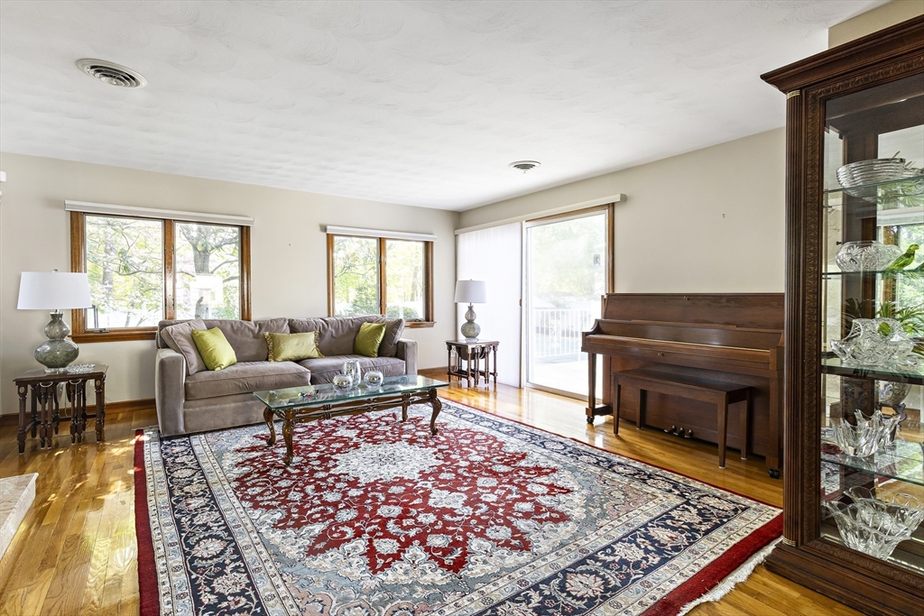 156 Woodcliff Road Newton, MA 02461 - Photo 6 of 17 a living room with furniture a rug and a window