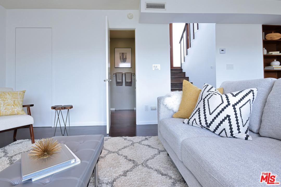 3605 Alta Mesa Drive Studio City, CA 91604 - Photo 33 of 47 a bedroom with furniture and a potted plant