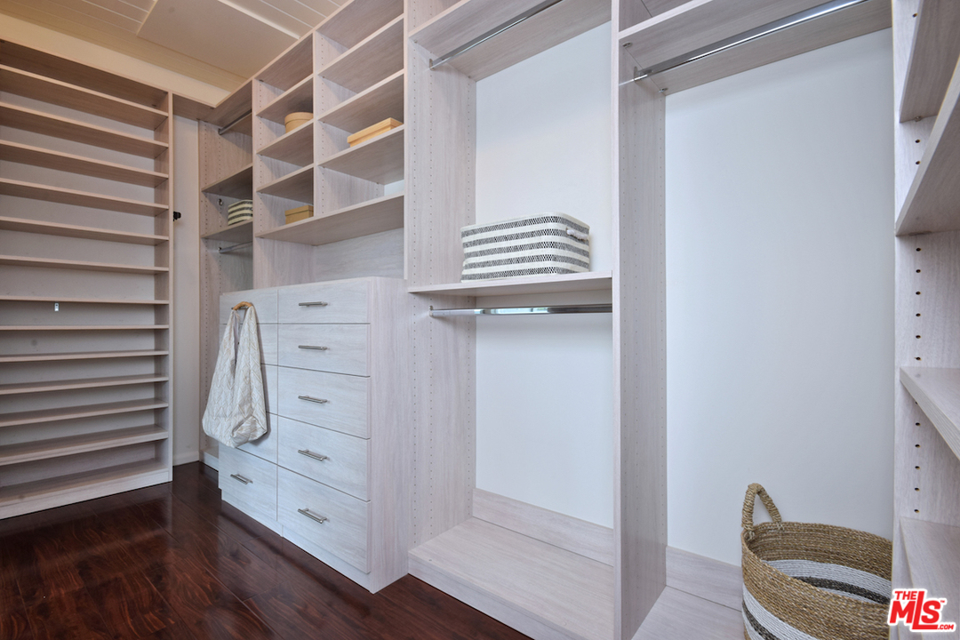 3605 Alta Mesa Drive Studio City, CA 91604 - Photo 40 of 47 a view of walk in closet with clothes and shoes