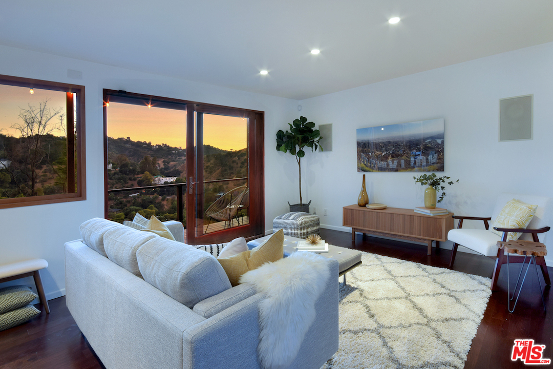 3605 Alta Mesa Drive Studio City, CA 91604 - Photo 10 of 47 a living room with furniture and a large window