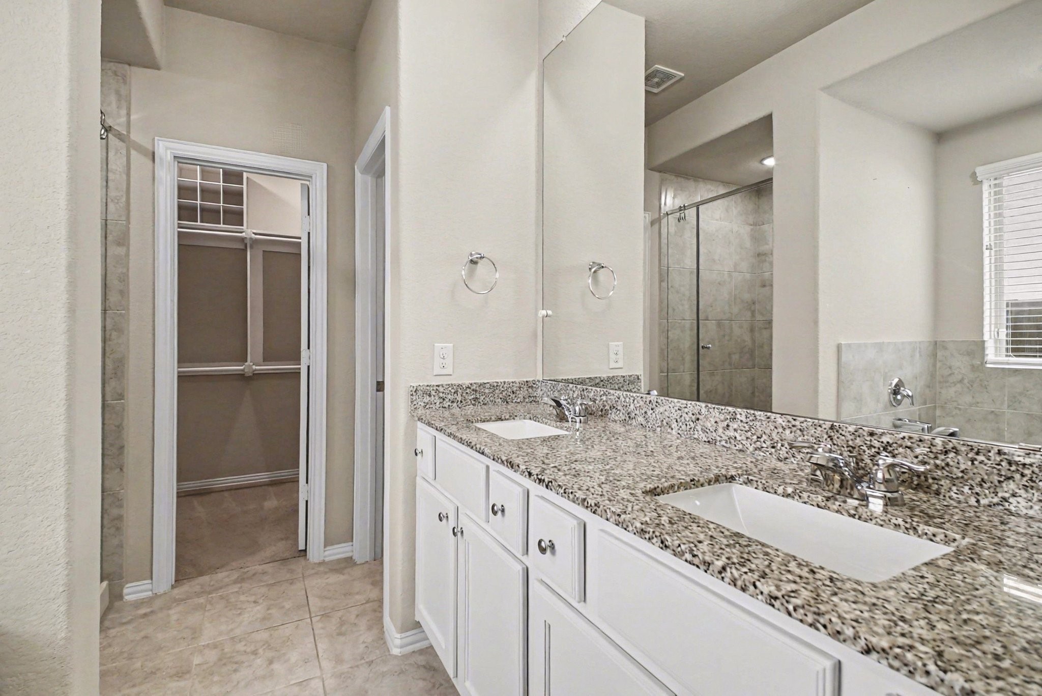 10602 Wagner Street Rosharon, TX 77583 - Photo 14 of 35 a bathroom with a granite countertop sink and a mirror