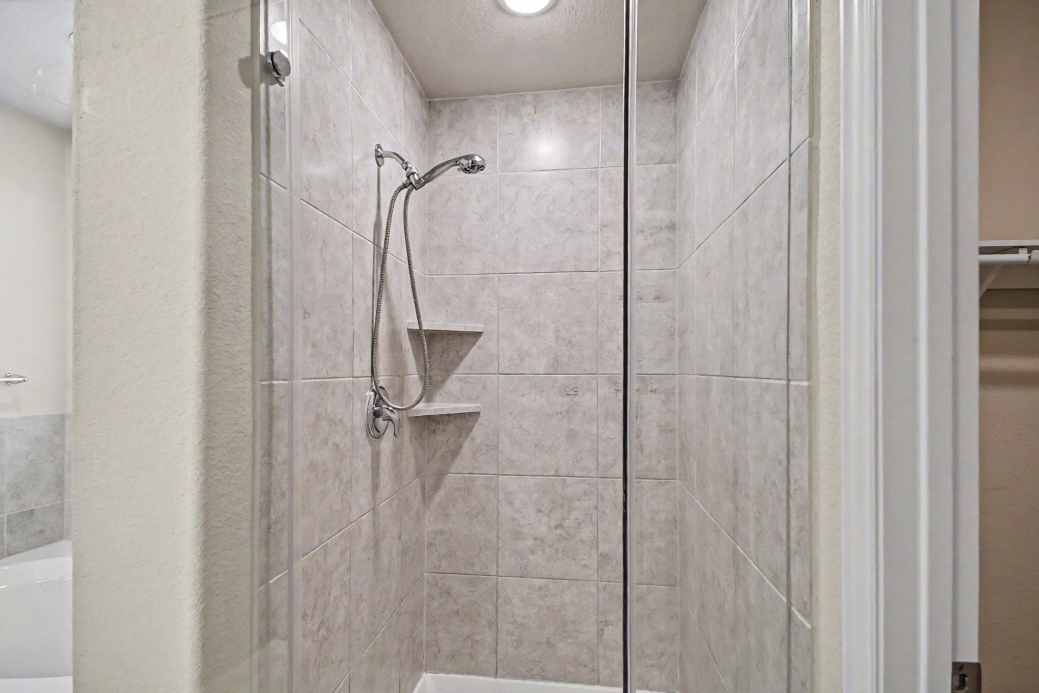 10602 Wagner Street Rosharon, TX 77583 - Photo 16 of 35 a bathroom with a shower