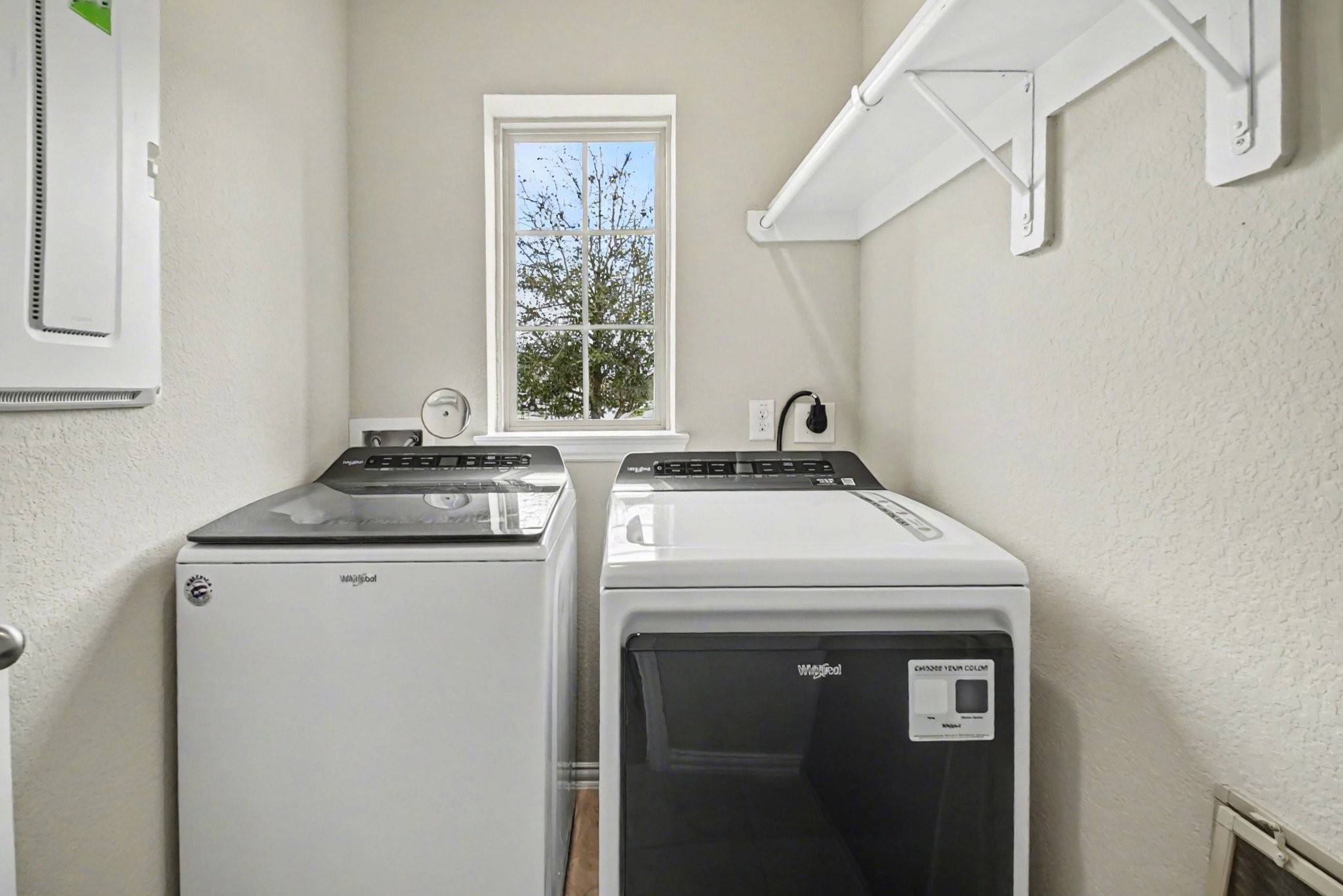 10602 Wagner Street Rosharon, TX 77583 - Photo 21 of 35 a utility room with dryer and washer