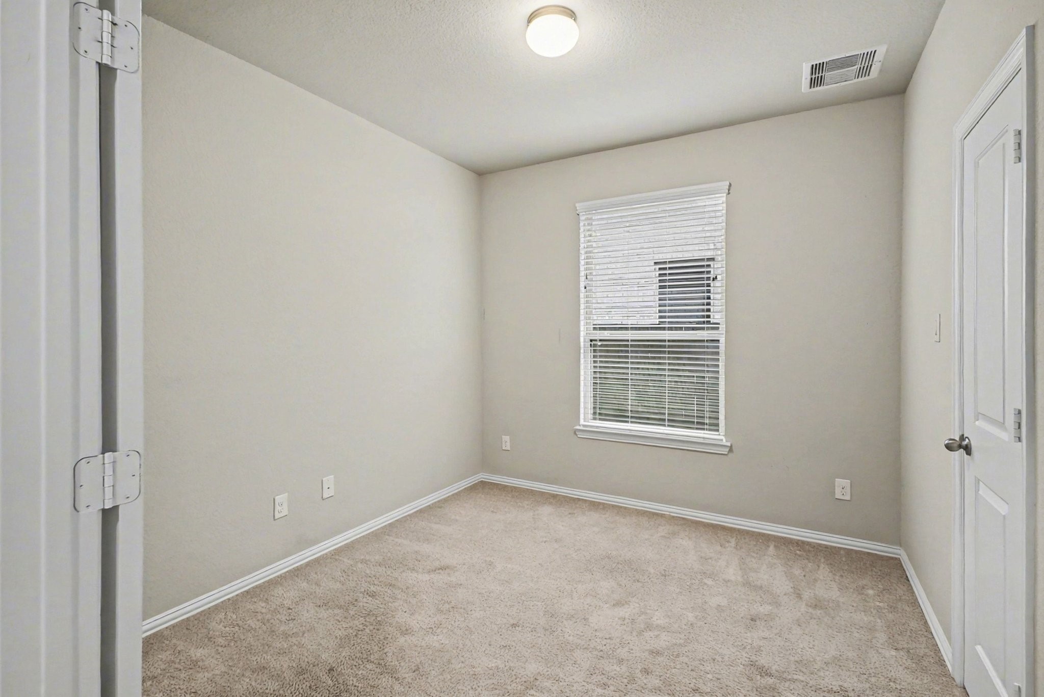10602 Wagner Street Rosharon, TX 77583 - Photo 27 of 35 a view of an empty room with a window