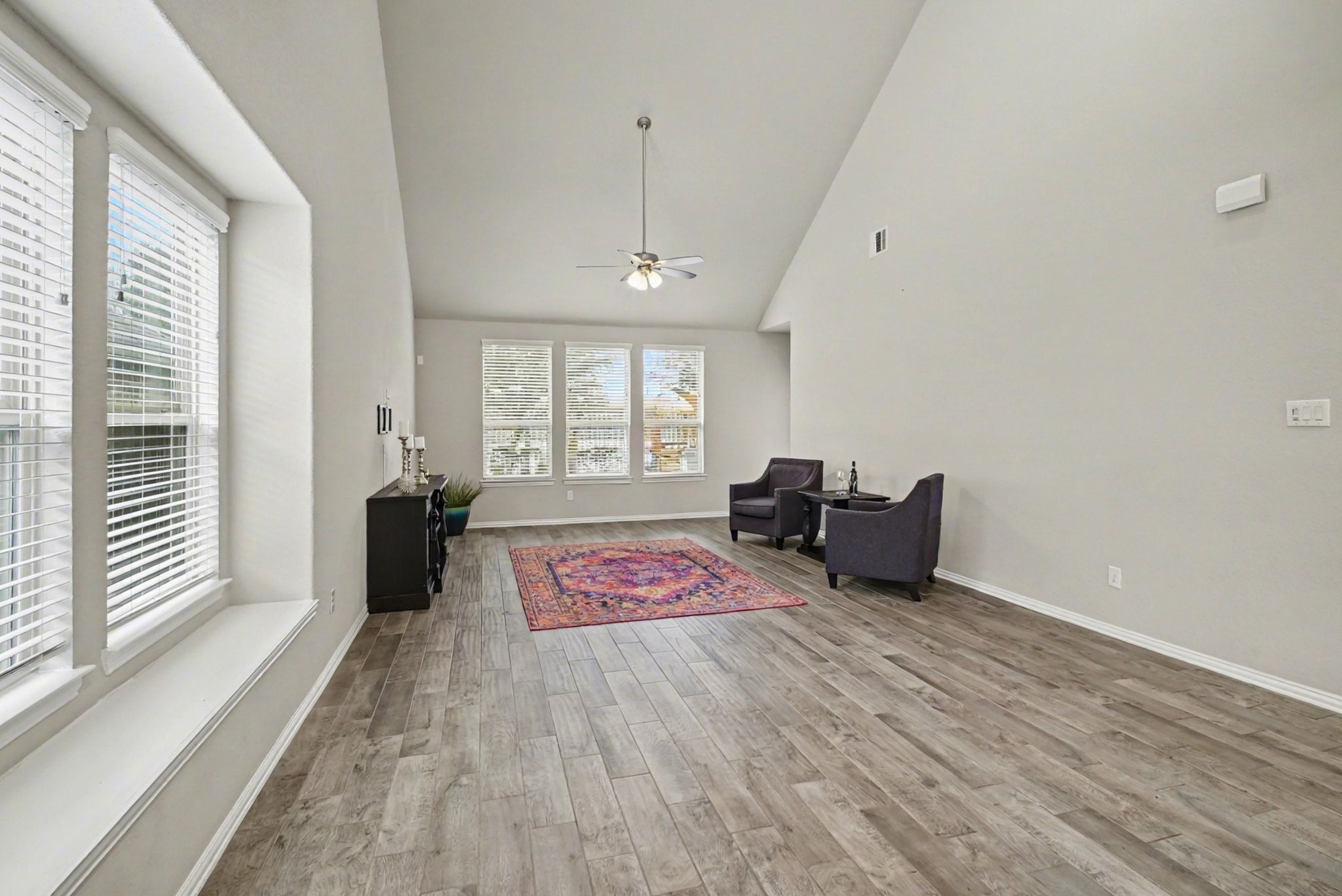 10602 Wagner Street Rosharon, TX 77583 - Photo 8 of 35 a bed room with a bed and a chair