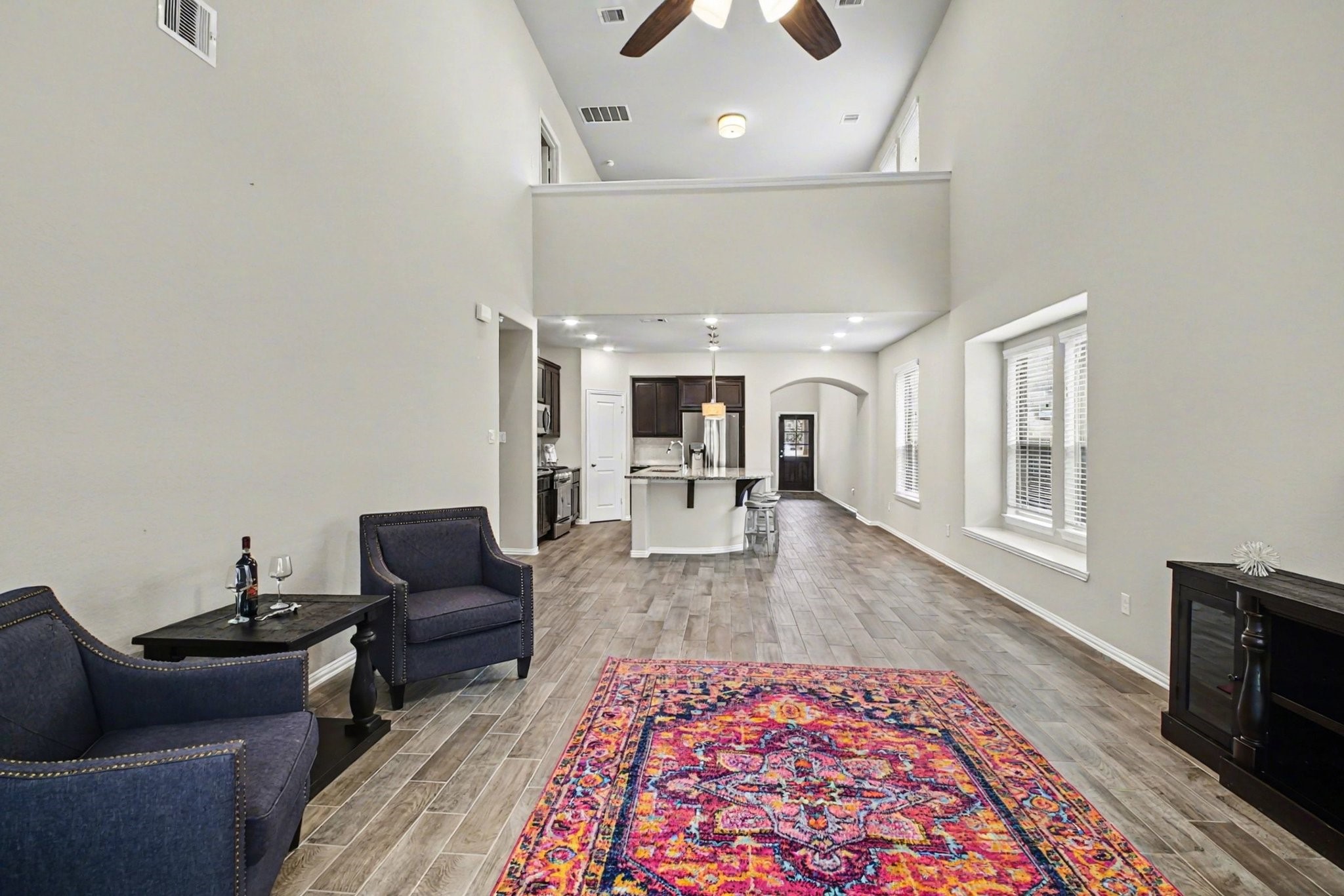 10602 Wagner Street Rosharon, TX 77583 - Photo 9 of 35 a living room with furniture and a rug