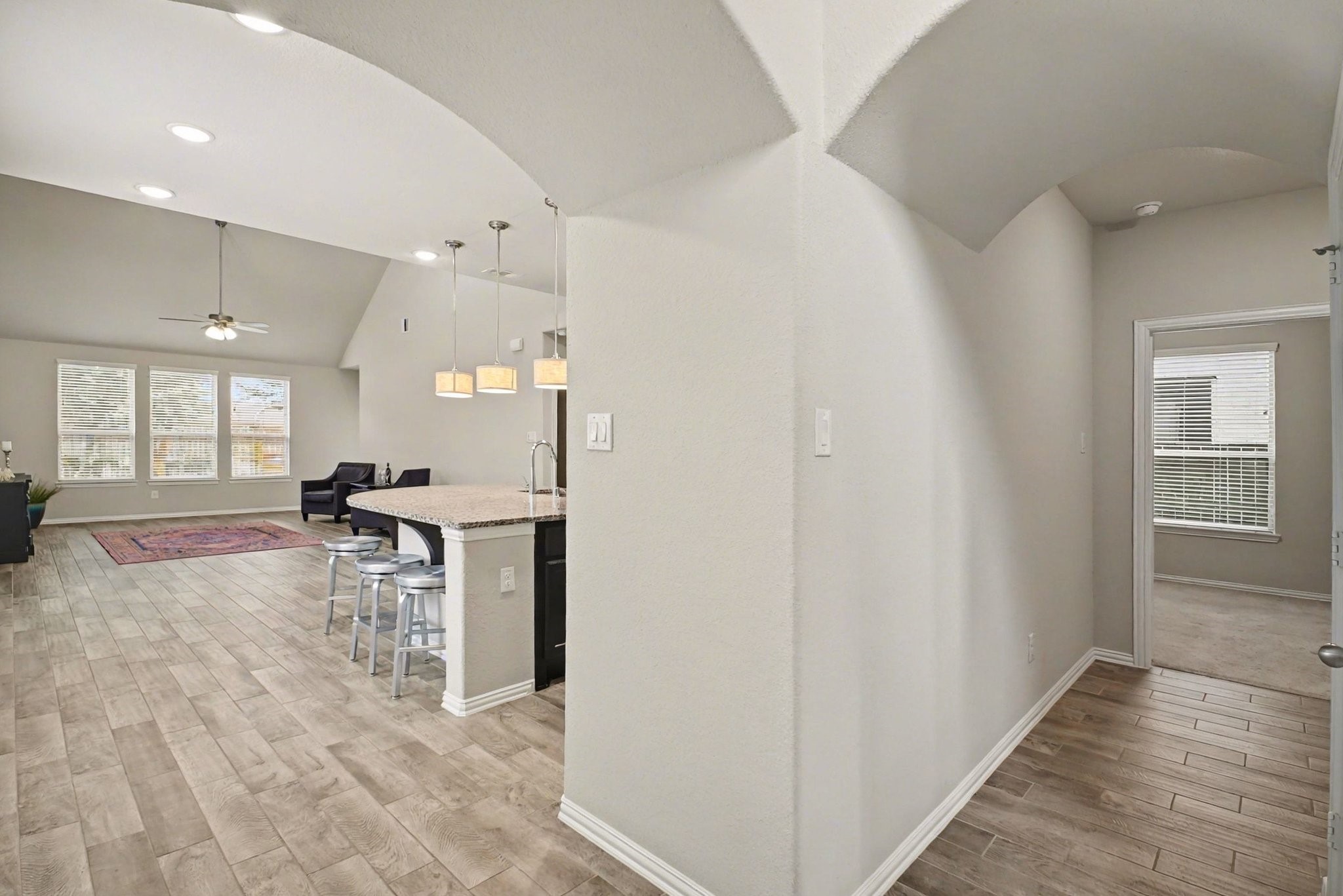 10602 Wagner Street Rosharon, TX 77583 - Photo 10 of 35 a living room with furniture a dining table and chairs