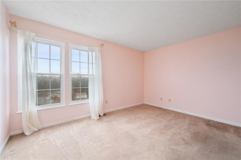 522 Leland Drive Pittsburgh, PA 15236 - Photo 18 of 22 an empty room with windows