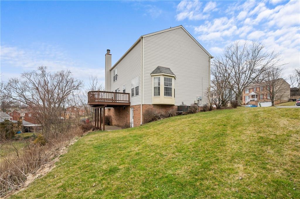 522 Leland Drive Pittsburgh, PA 15236 - Photo 21 of 22 a front view of a house with a yard