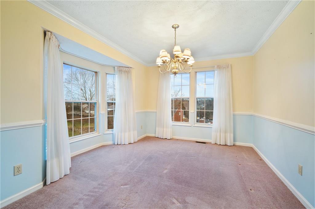 522 Leland Drive Pittsburgh, PA 15236 - Photo 5 of 22 a view of an empty room with a window