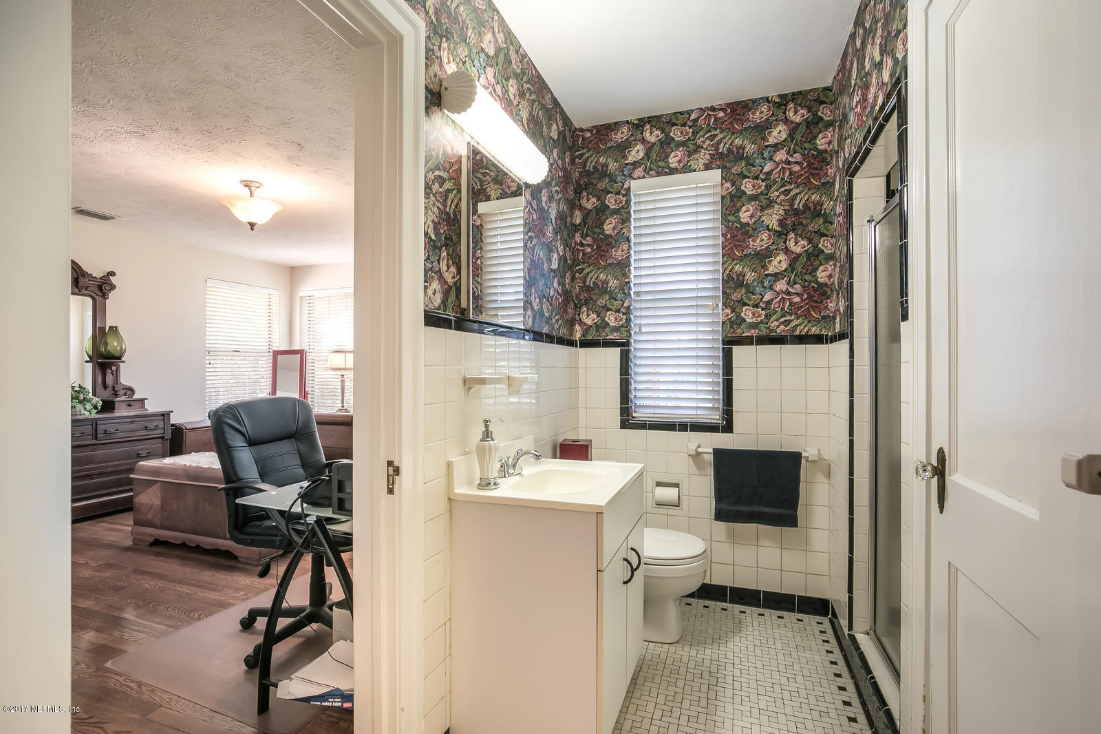 1229 Nicholson Road Jacksonville, FL 32207 - Photo 21 of 29 a view of a hallway with workspace and a window