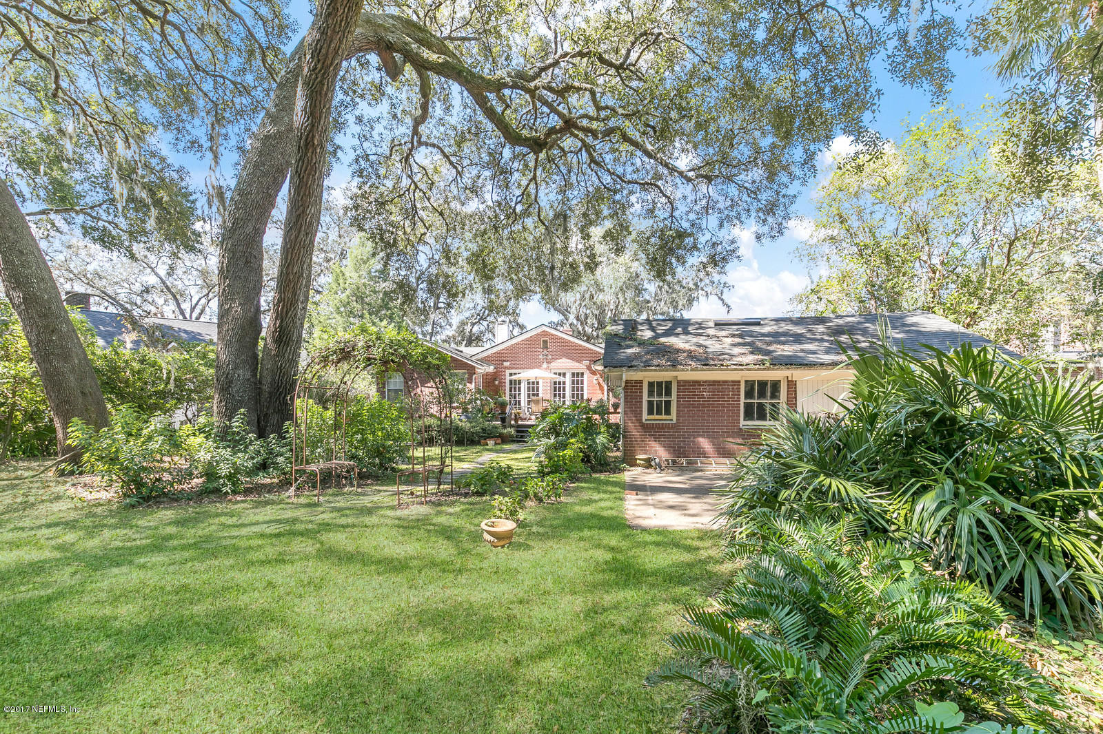 1229 Nicholson Road Jacksonville, FL 32207 - Photo 25 of 29 a front view of a house with a yard