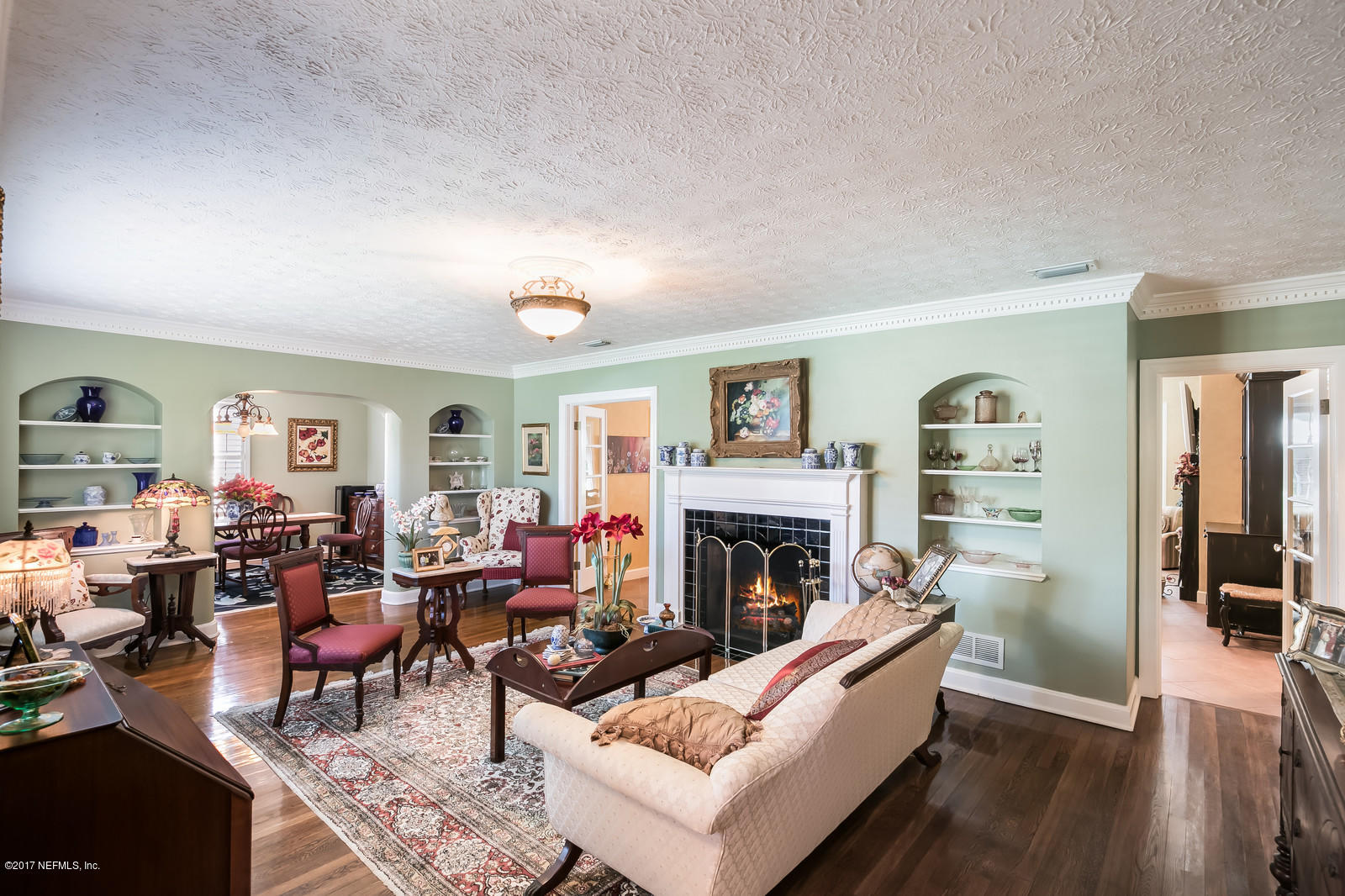 1229 Nicholson Road Jacksonville, FL 32207 - Photo 4 of 29 a living room with furniture and a fireplace