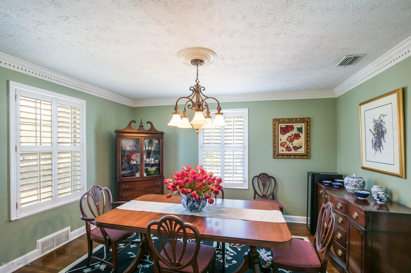 1229 Nicholson Road Jacksonville, FL 32207 - Photo 6 of 29 a view of a dining room with furniture window and wooden floor