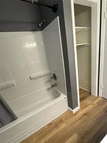 a view of a backyard with sitting area