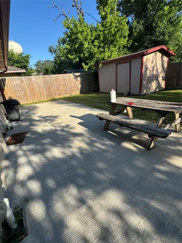 a view of backyard with green space