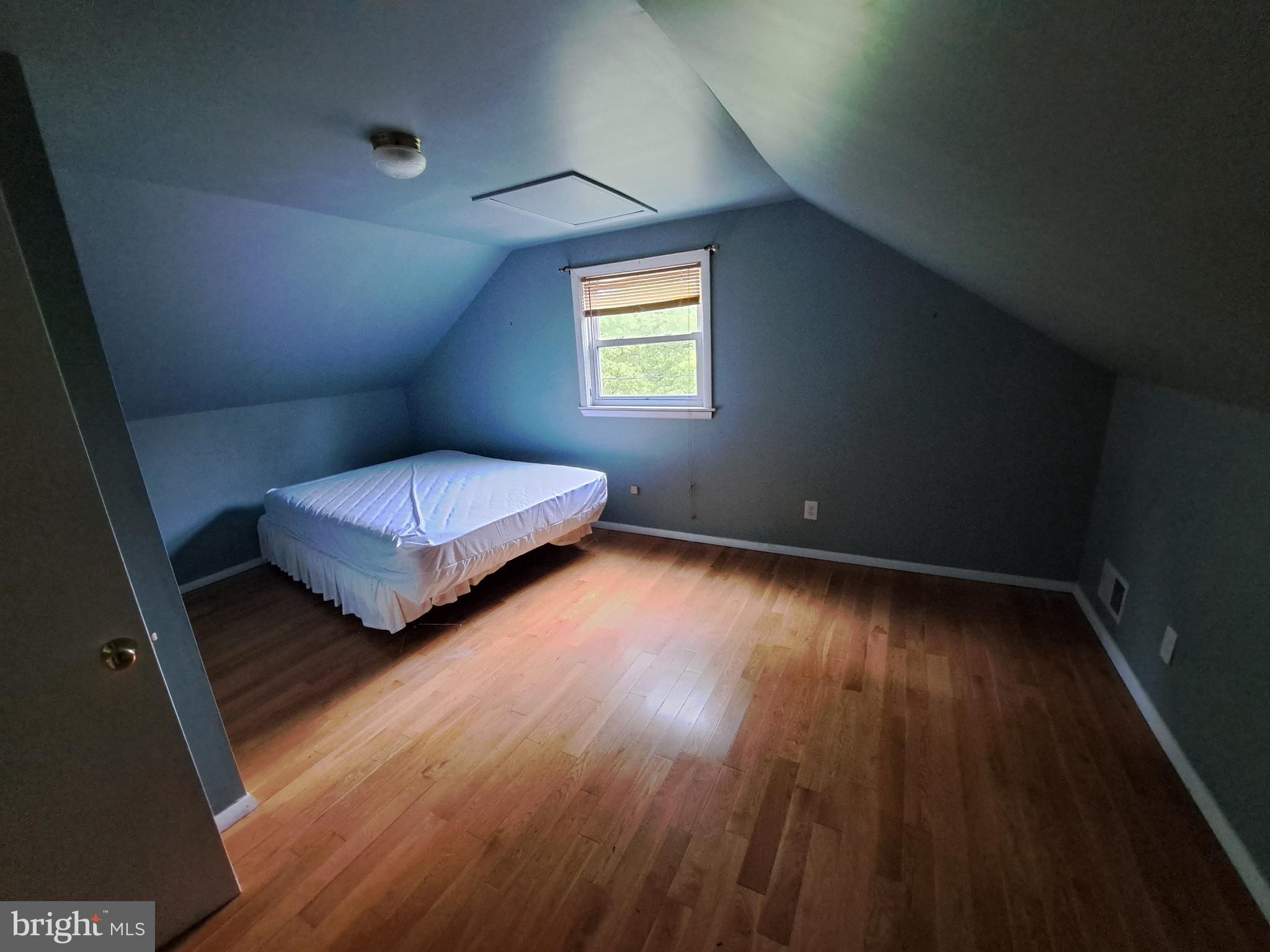 1371 Lower Ferry Road Ewing, NJ 08618 - Photo 13 of 18 a bedroom with two beds and a potted plant